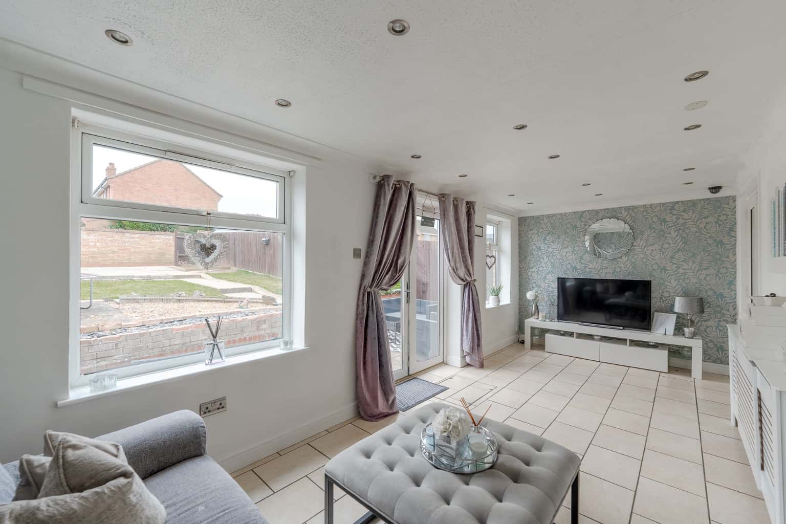 Beautifully extended four bedroom end of terrace property overlooking open green space to front Property image 12