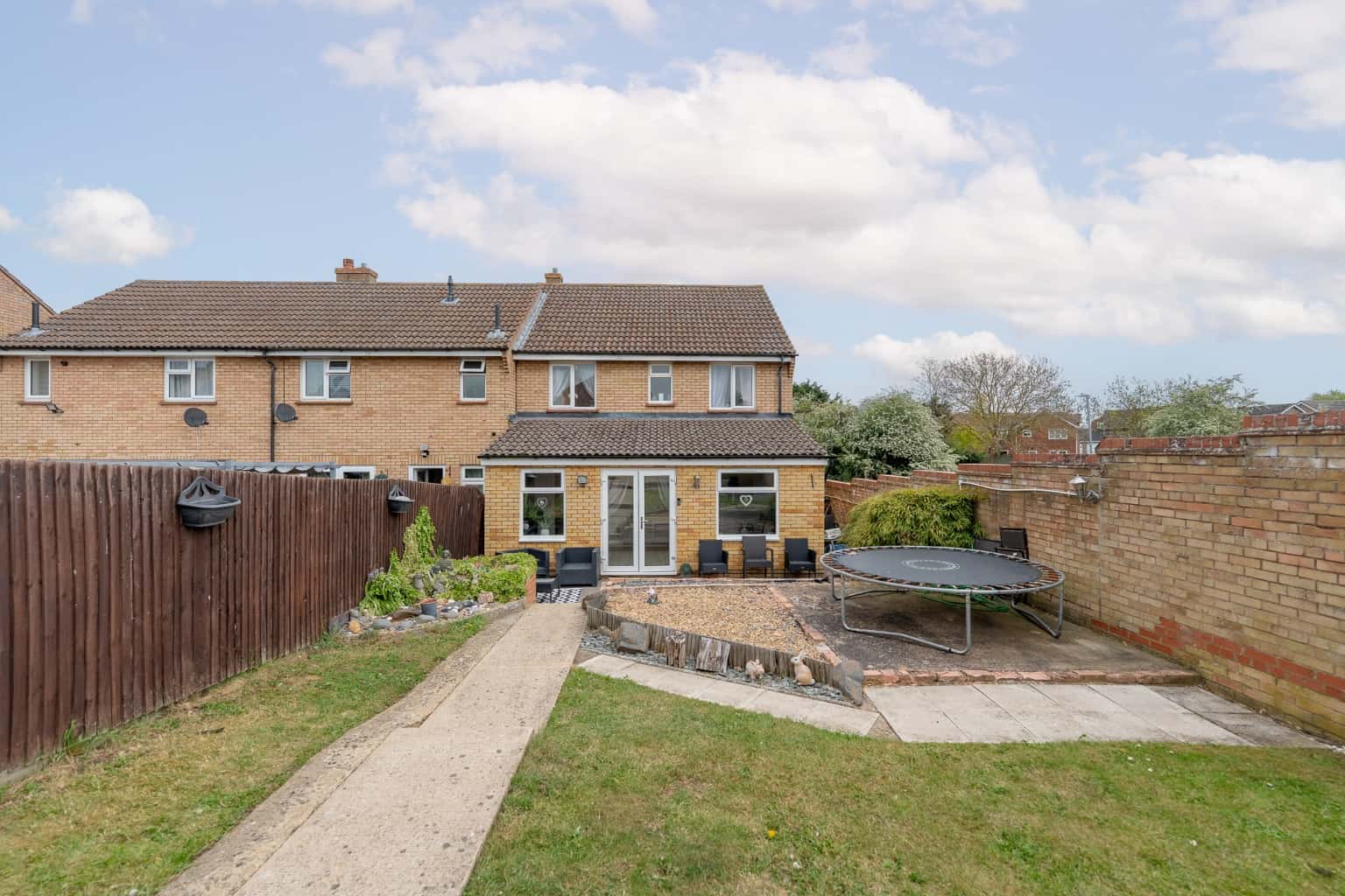 Beautifully extended four bedroom end of terrace property overlooking open green space to front Property image 2