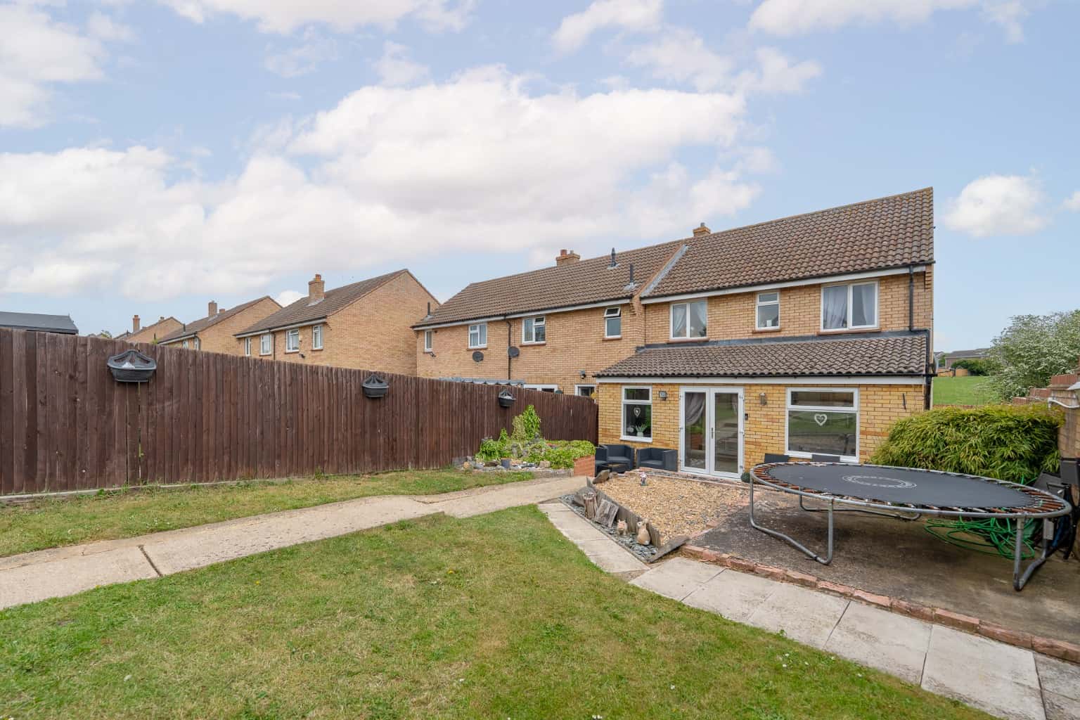 Beautifully extended four bedroom end of terrace property overlooking open green space to front Property image 24