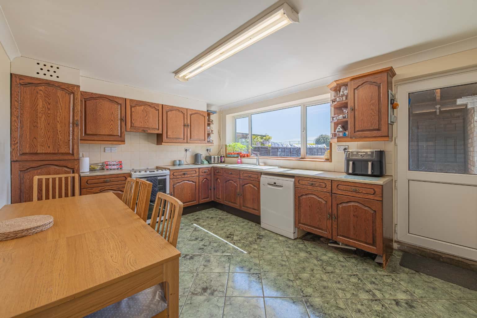 Three bedroom semi-detached home occupying a large plot with double garage. Property image 4