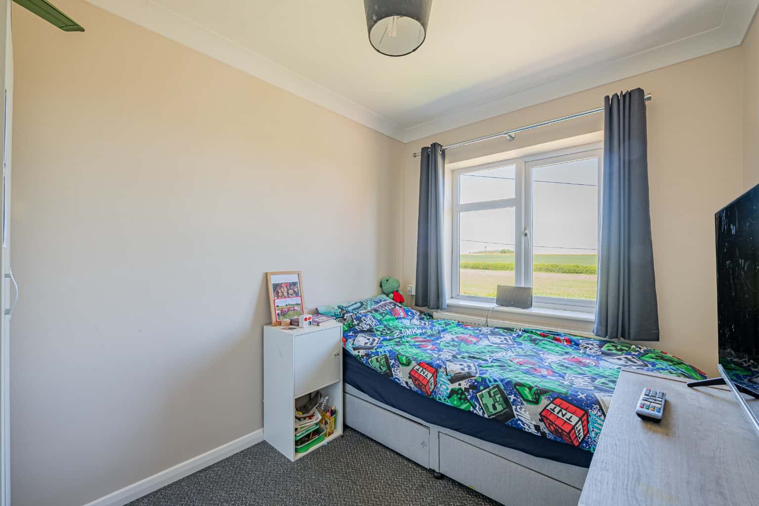 Three bedroom semi-detached home occupying a large plot with double garage. Property image 9
