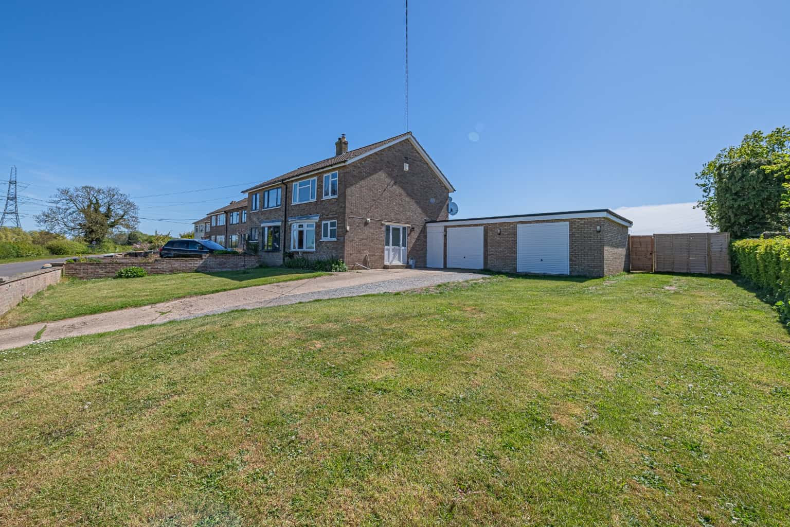 Three bedroom semi-detached home occupying a large plot with double garage. Property image 13
