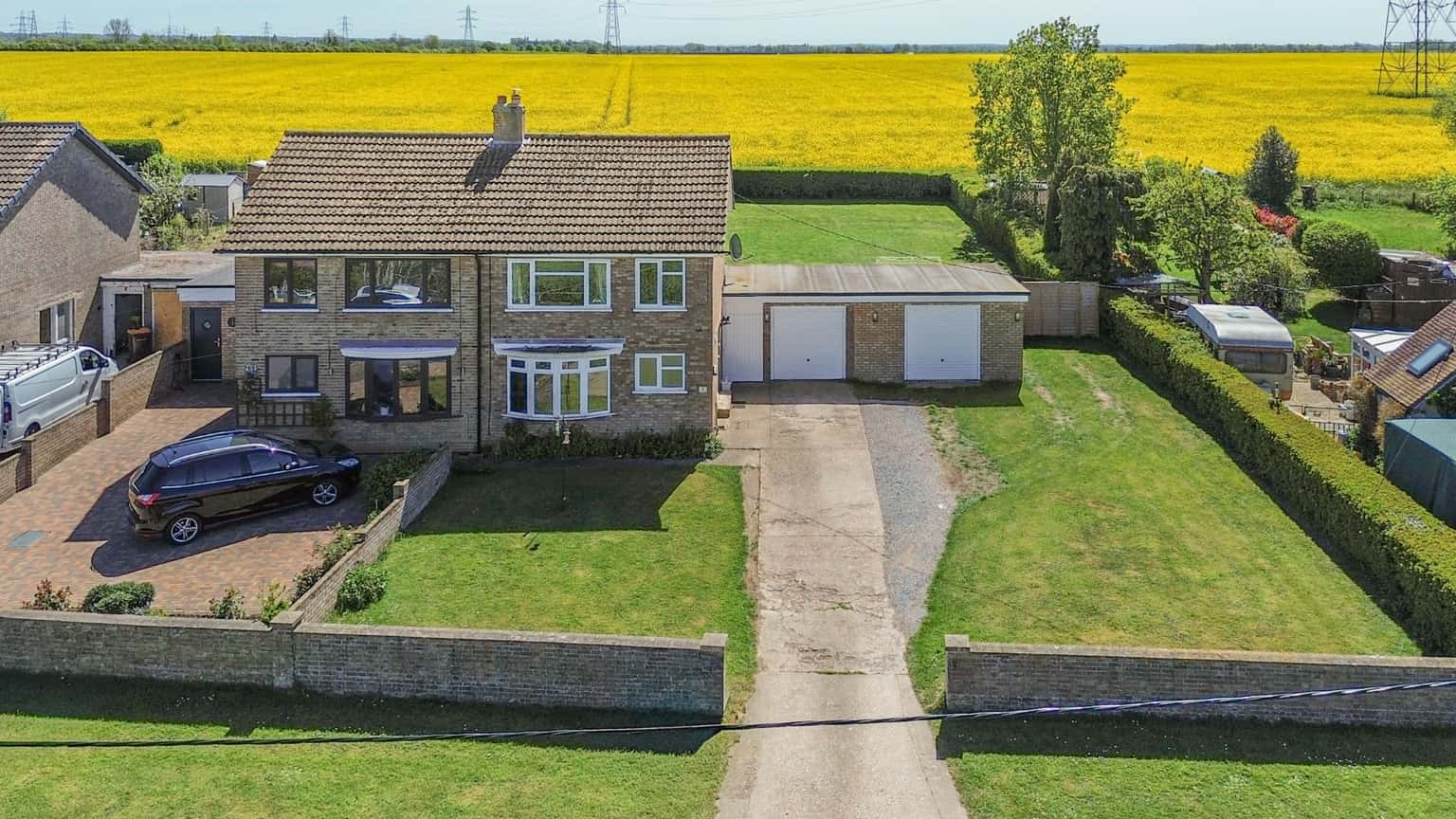 Three bedroom semi-detached home occupying a large plot with double garage. Property image 1
